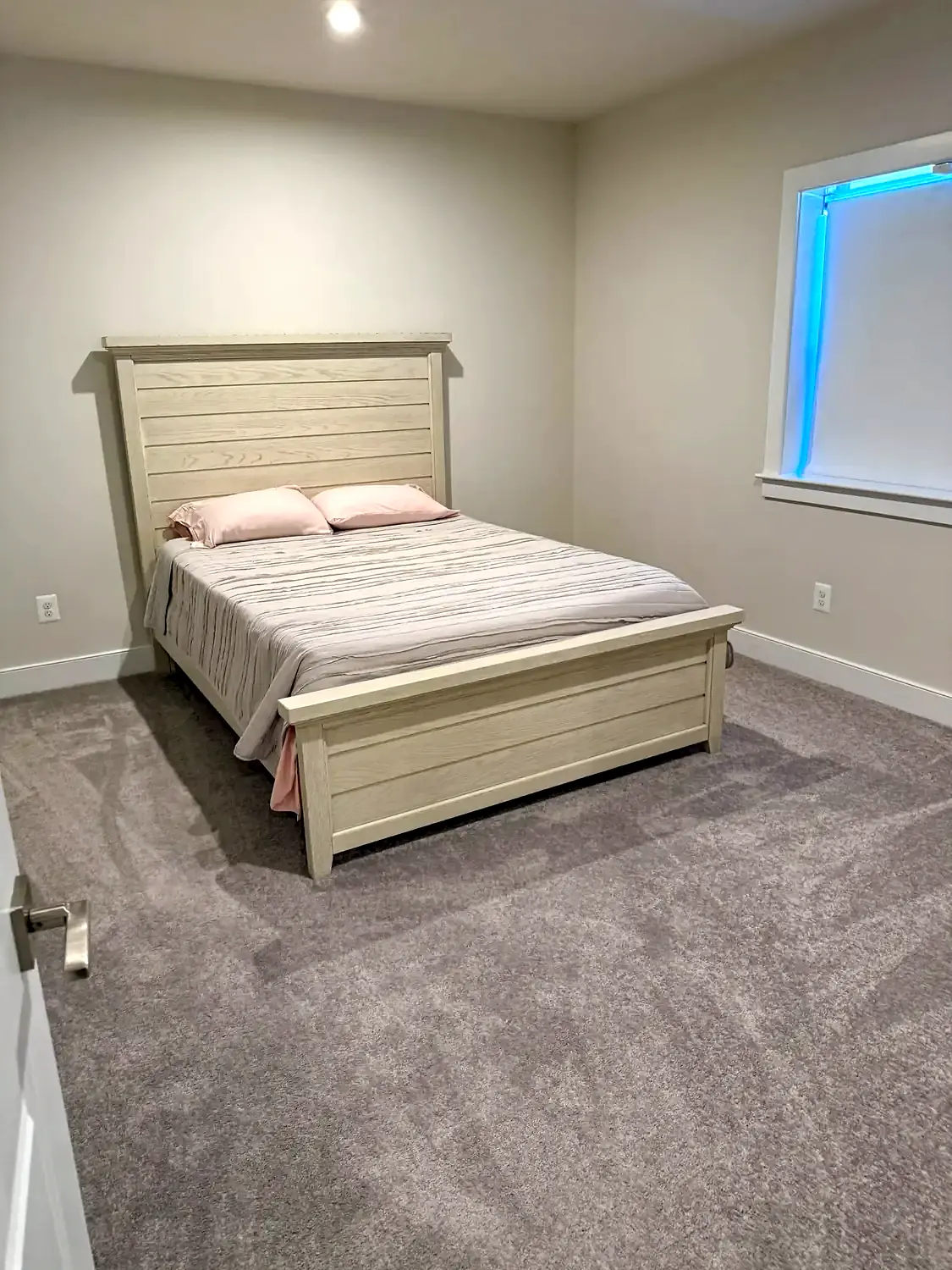 Finished basement living and guest space, basement finishing project in Northern Virginia by HOM Design & Build, view 4