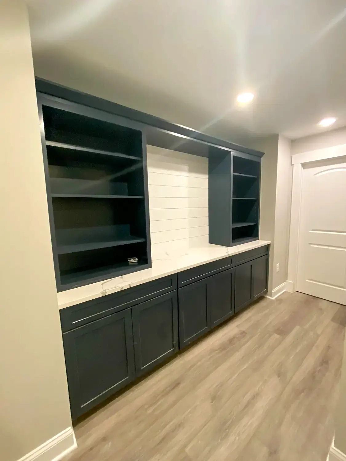 Finished-basement luxury vinyl, flooring project in Northern Virginia by HOM Design & Build, view 3