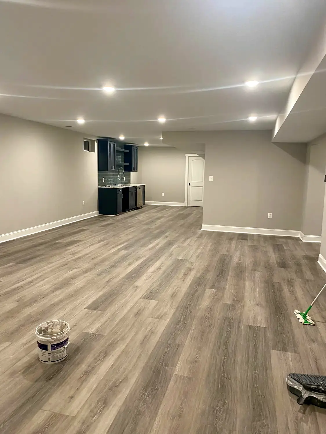 Finished-basement luxury vinyl, flooring project in Northern Virginia by HOM Design & Build, view 7