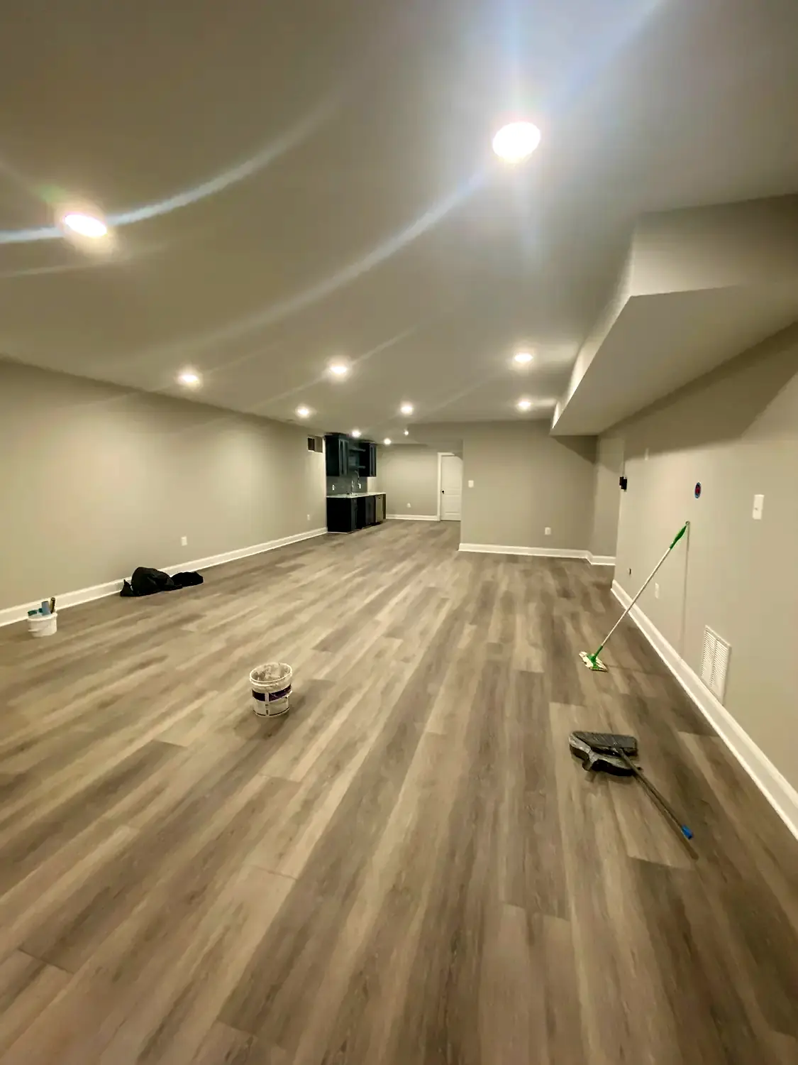 Finished-basement luxury vinyl, flooring project in Northern Virginia by HOM Design & Build, view 8