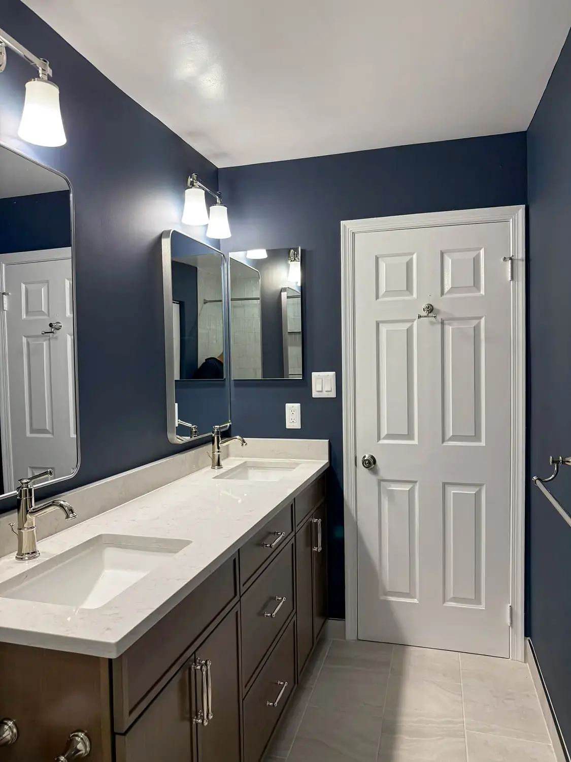 Finished bedroom and bathroom suite, basement finishing project in Northern Virginia by HOM Design & Build, view 3