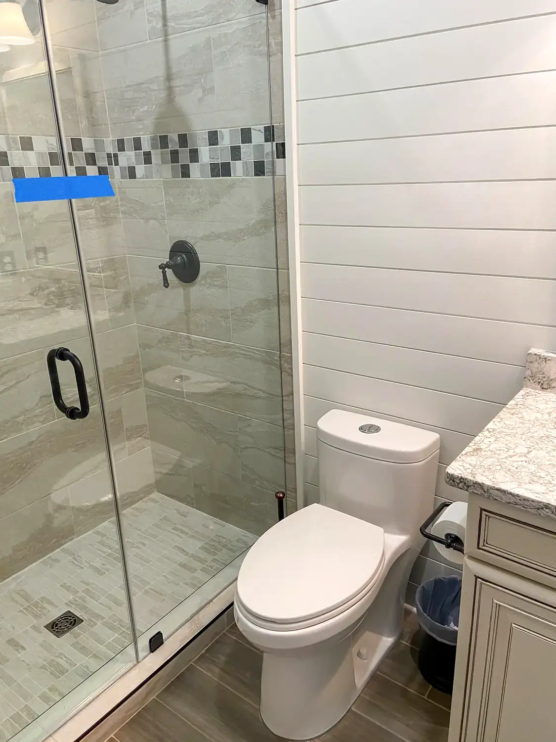 Glass shower and freestanding tub, bathroom remodeling project in Northern Virginia by HOM Design & Build, view 2