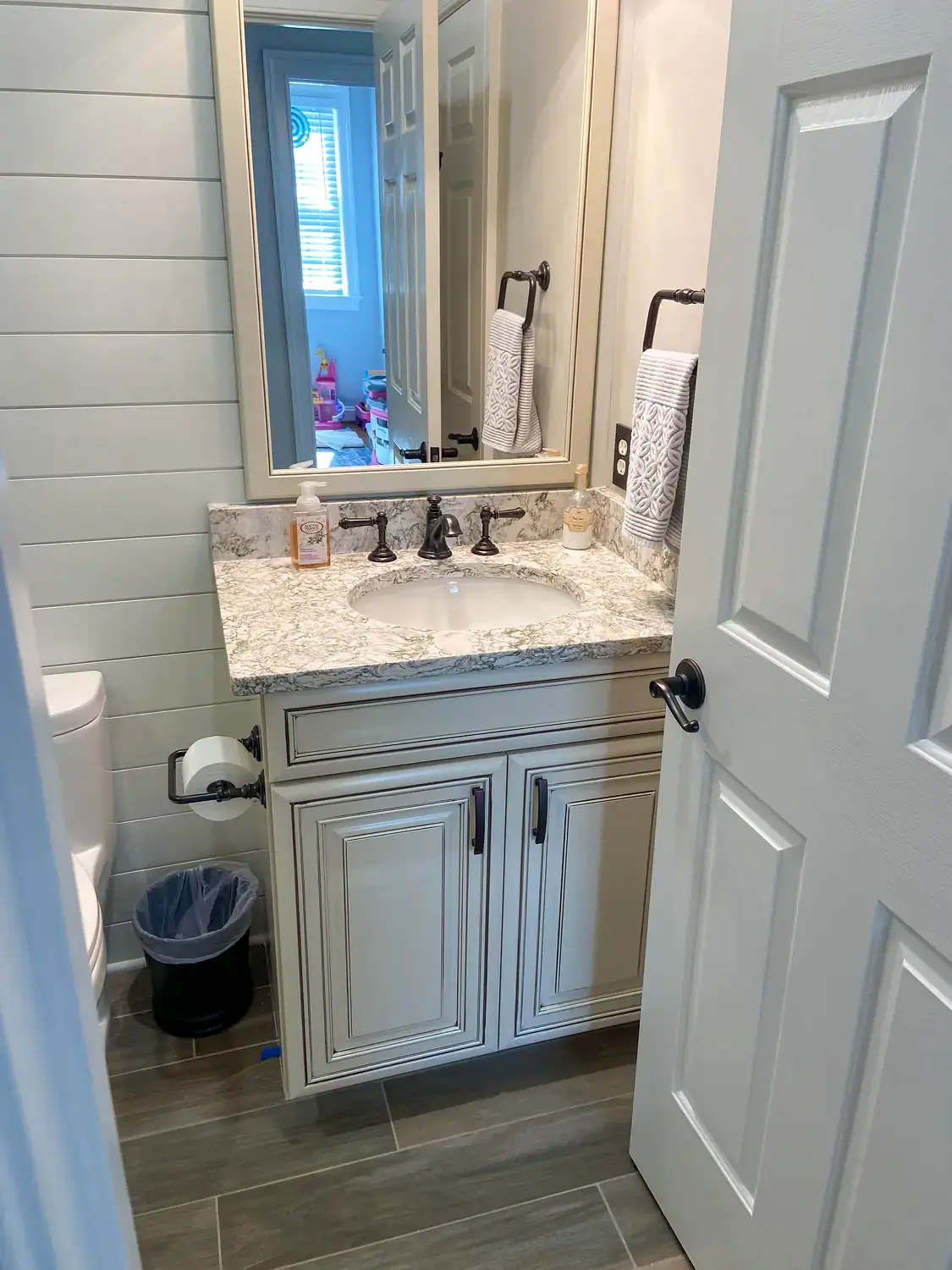 Glass shower and freestanding tub, bathroom remodeling project in Northern Virginia by HOM Design & Build, view 3
