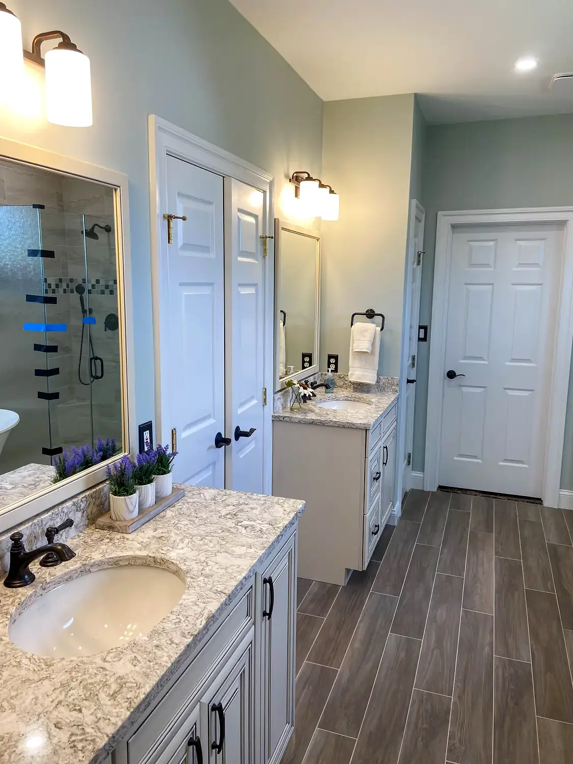 Glass shower and freestanding tub, bathroom remodeling project in Northern Virginia by HOM Design & Build, view 4