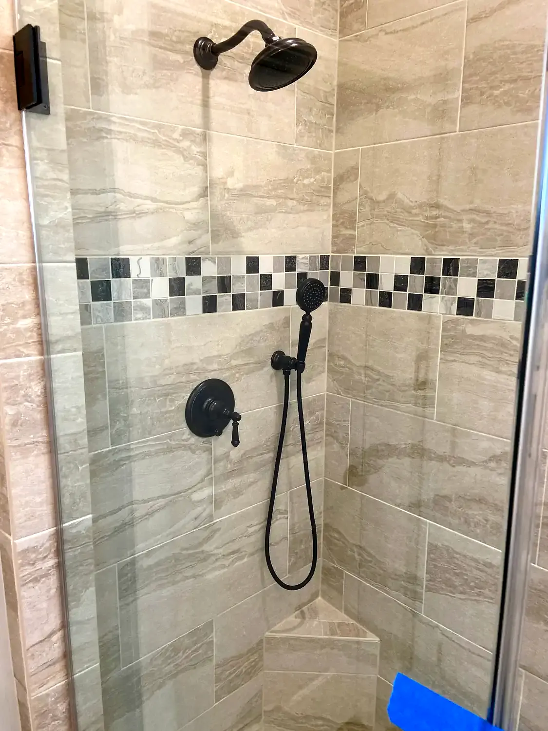 Glass shower and freestanding tub, bathroom remodeling project in Northern Virginia by HOM Design & Build, view 8
