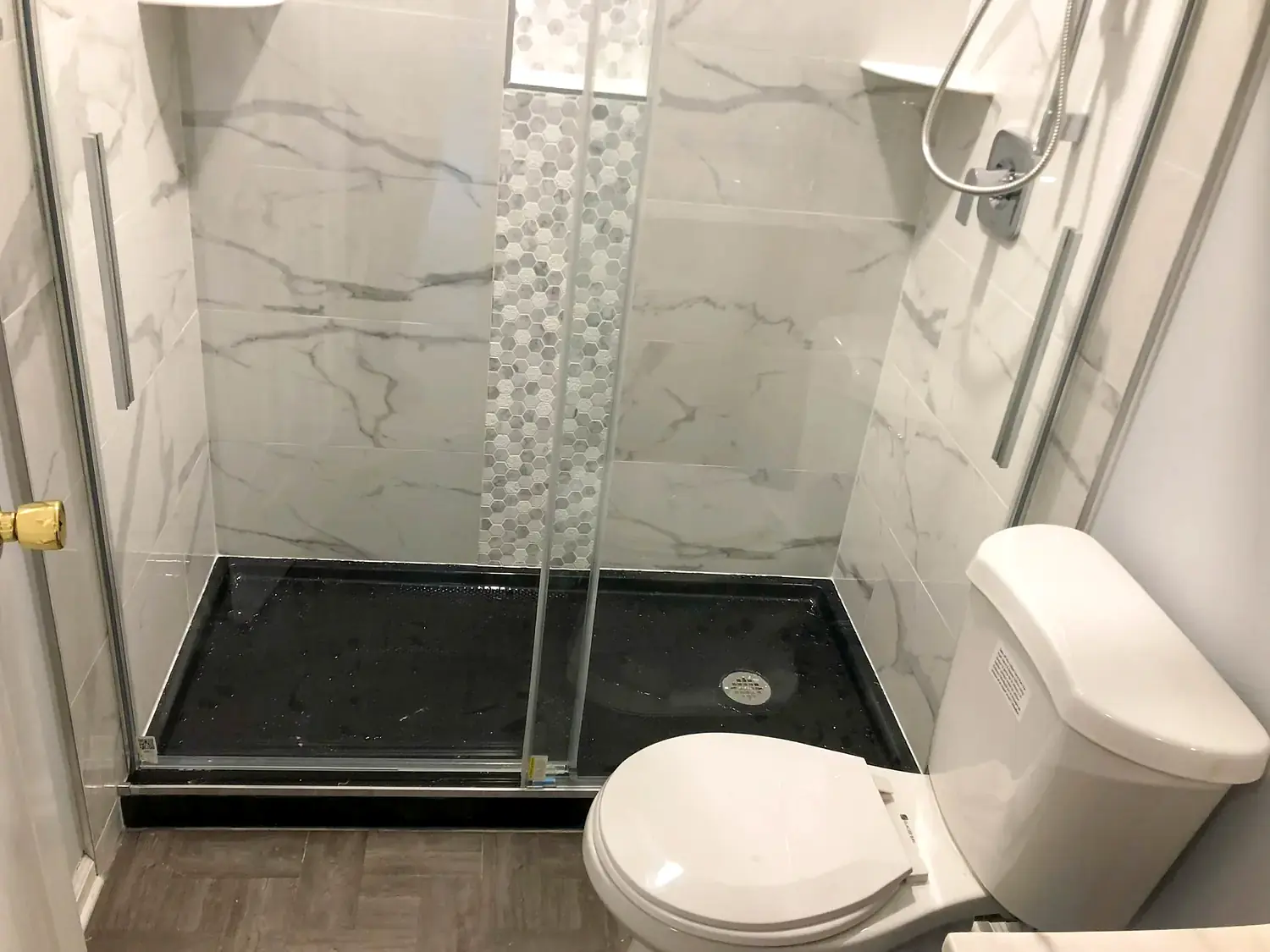 Marble-look walk-in shower, bathroom remodeling project in Northern Virginia by HOM Design & Build, view 2