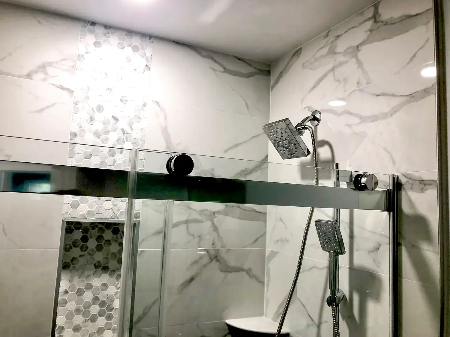 Marble-look walk-in shower, bathroom remodeling project in Northern Virginia by HOM Design & Build, view 10