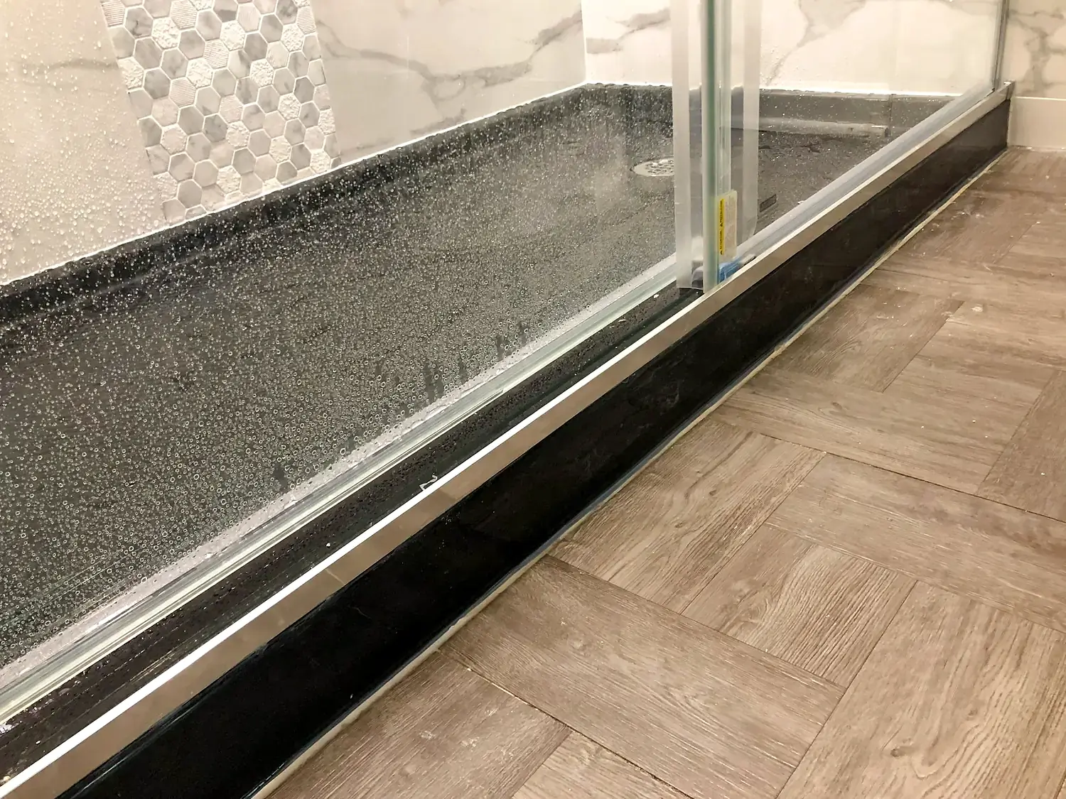 Marble-look walk-in shower, bathroom remodeling project in Northern Virginia by HOM Design & Build, view 18