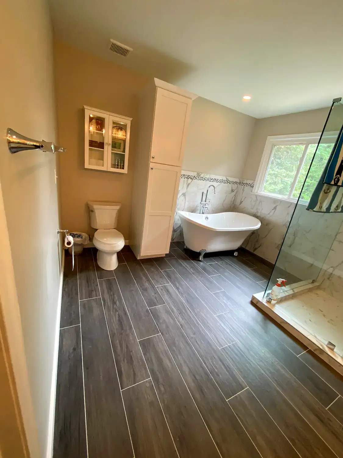 Primary bathroom with soaking tub, bathroom remodeling project in Northern Virginia by HOM Design & Build, view 2