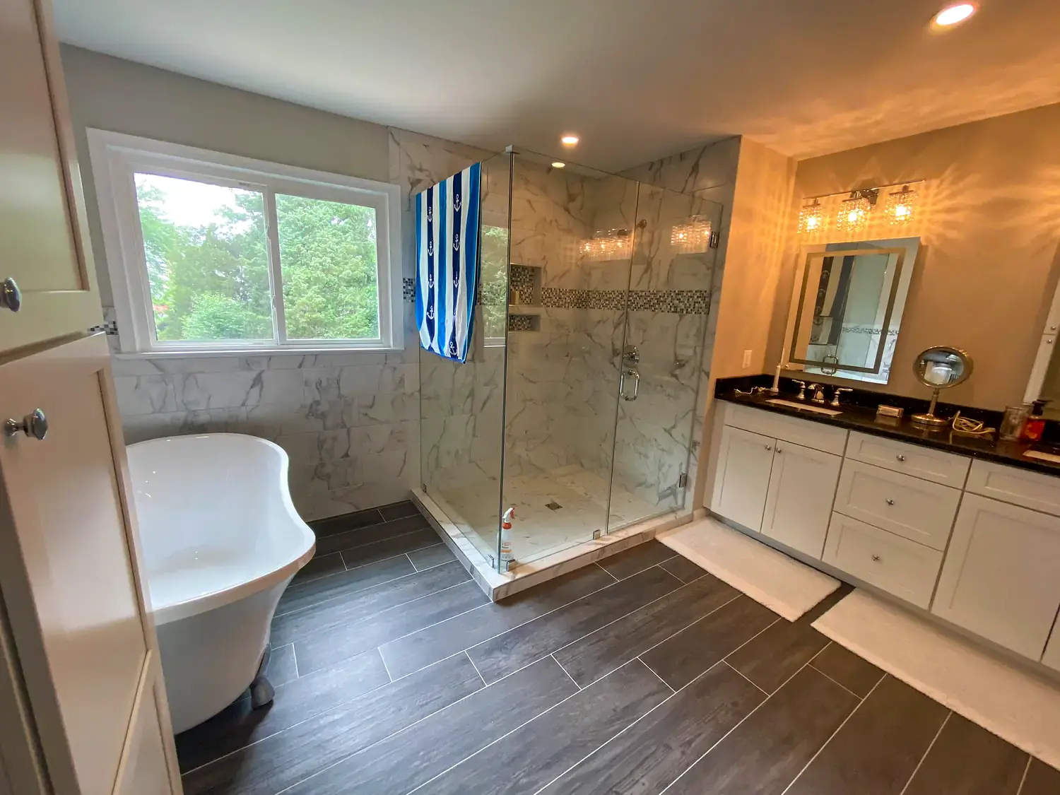 Primary bathroom with soaking tub, bathroom remodeling project in Northern Virginia by HOM Design & Build, view 4