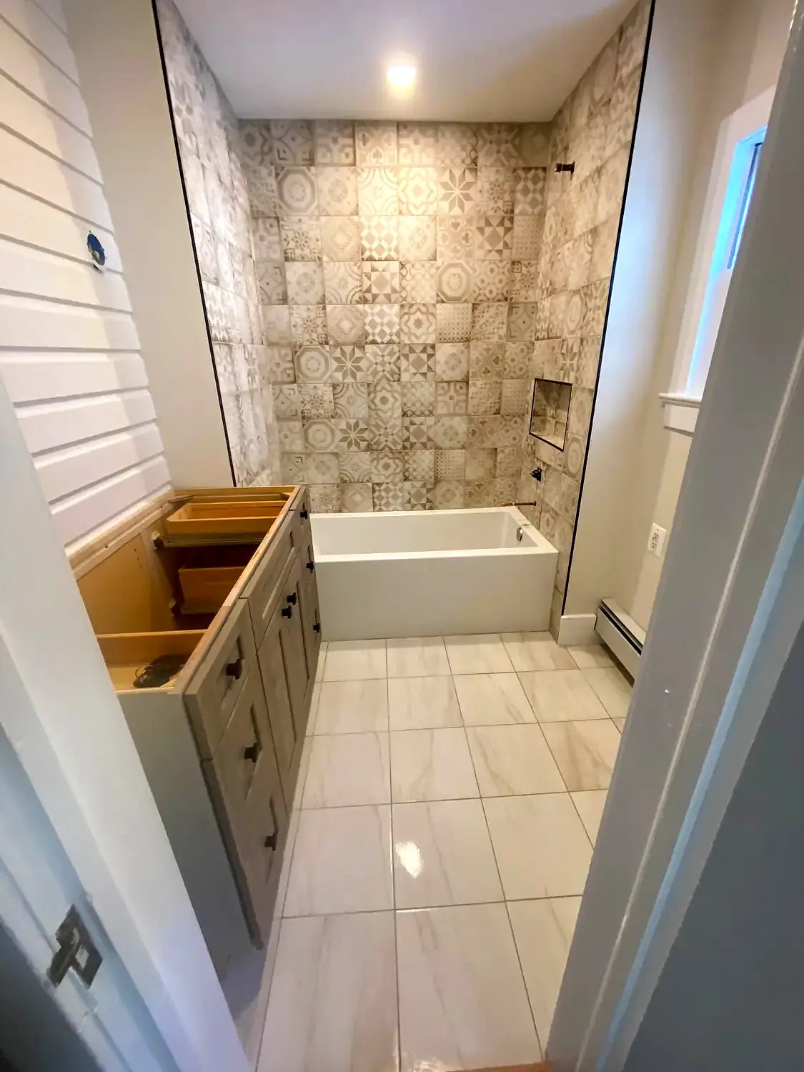 Tub surround and vanity, bathroom remodeling project in Northern Virginia by HOM Design & Build, view 4