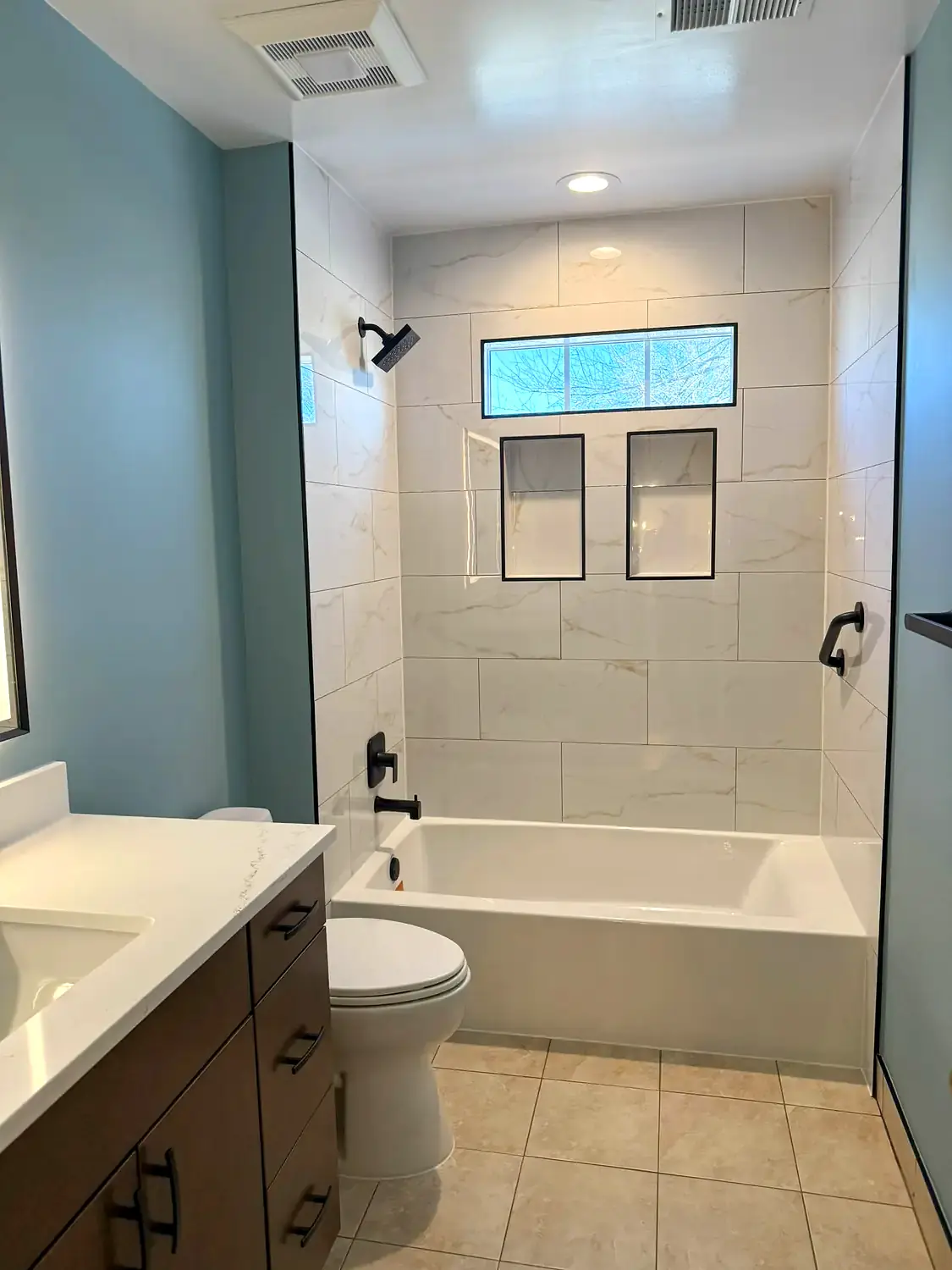 Blue hall bathroom, bathroom remodeling project in Northern Virginia by HOM Design & Build, view 2