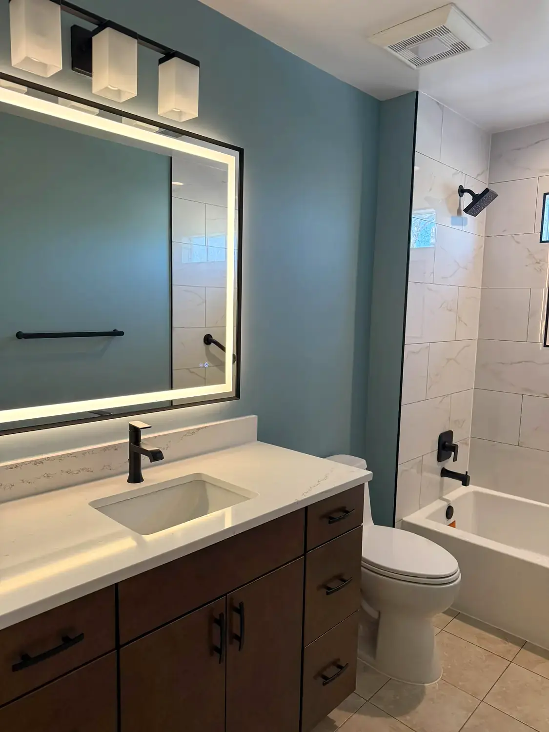 Blue hall bathroom, bathroom remodeling project in Northern Virginia by HOM Design & Build, view 3