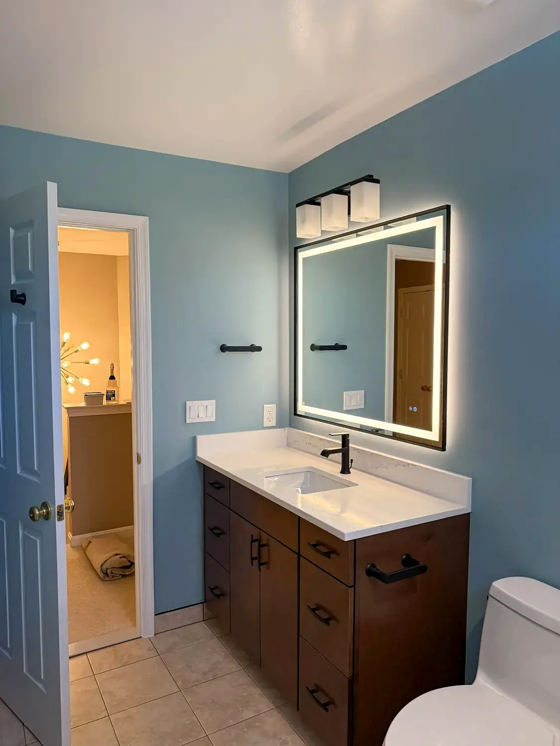 Blue hall bathroom, bathroom remodeling project in Northern Virginia by HOM Design & Build, view 5