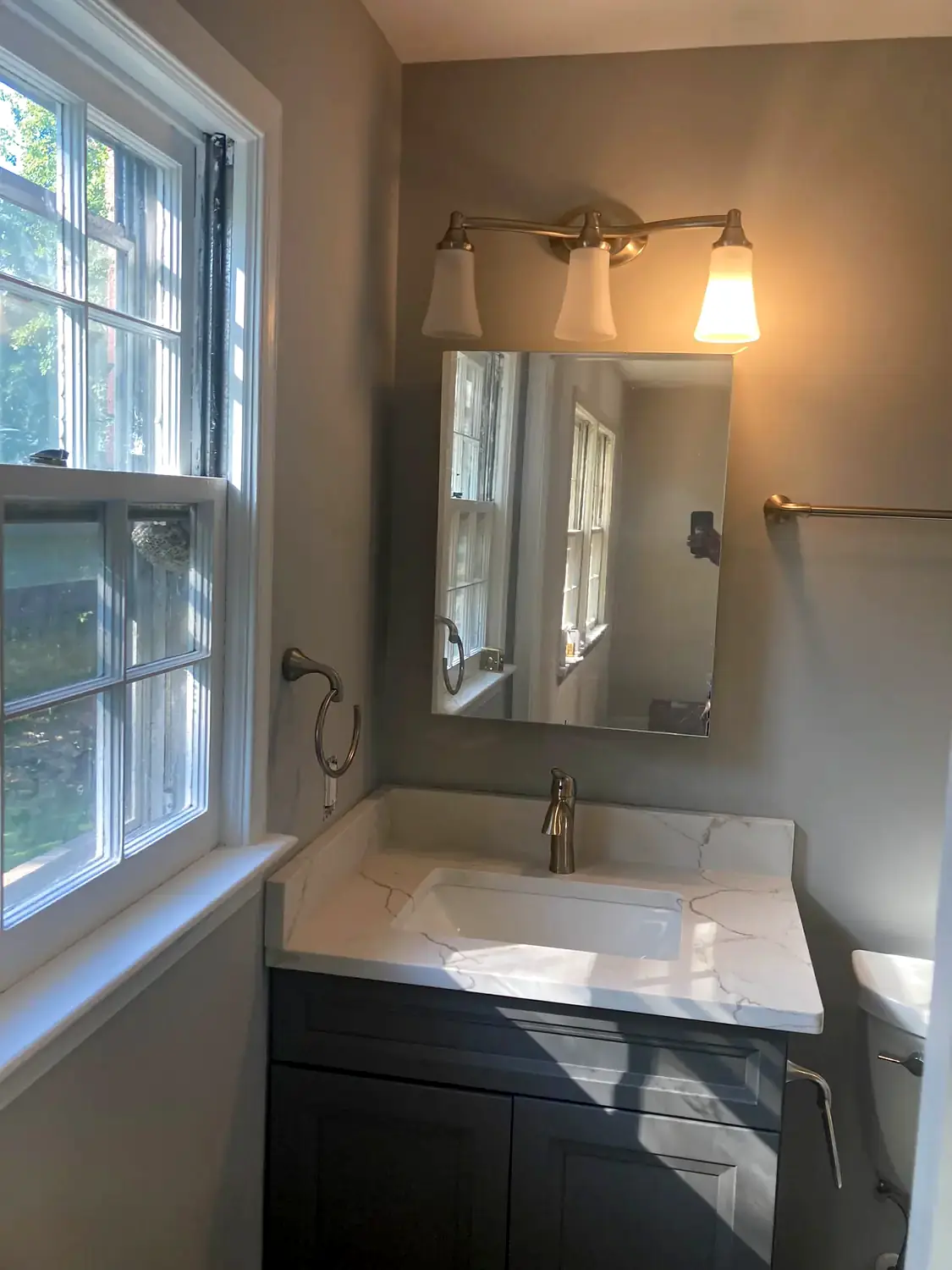 Marble corner shower, bathroom remodeling project in Northern Virginia by HOM Design & Build, view 2