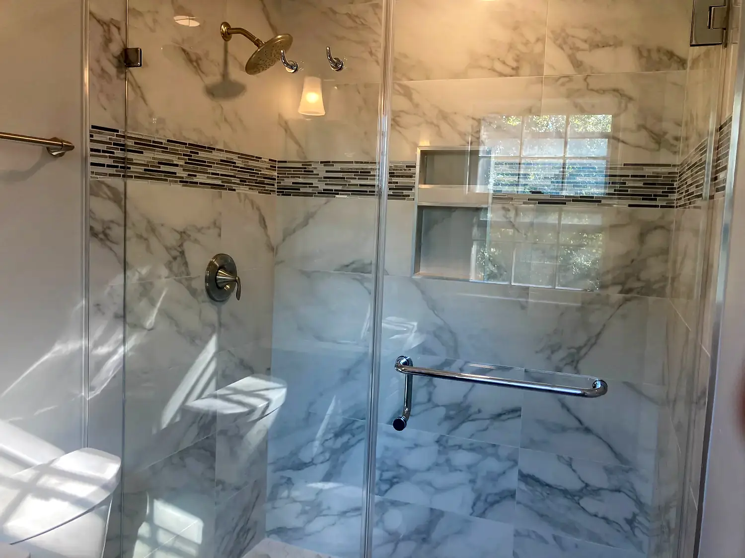 Marble corner shower, bathroom remodeling project in Northern Virginia by HOM Design & Build, view 6