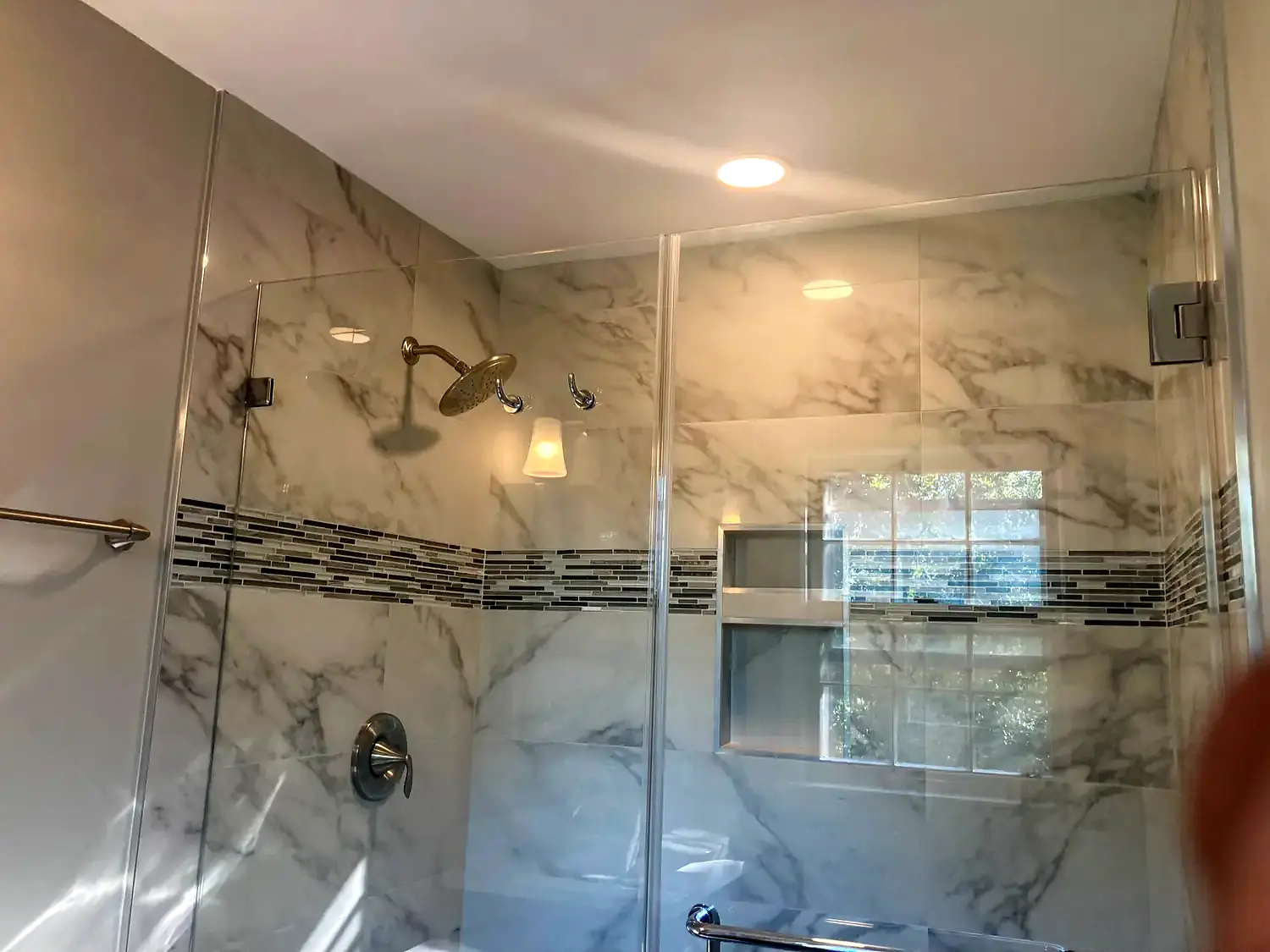 Marble corner shower, bathroom remodeling project in Northern Virginia by HOM Design & Build, view 7