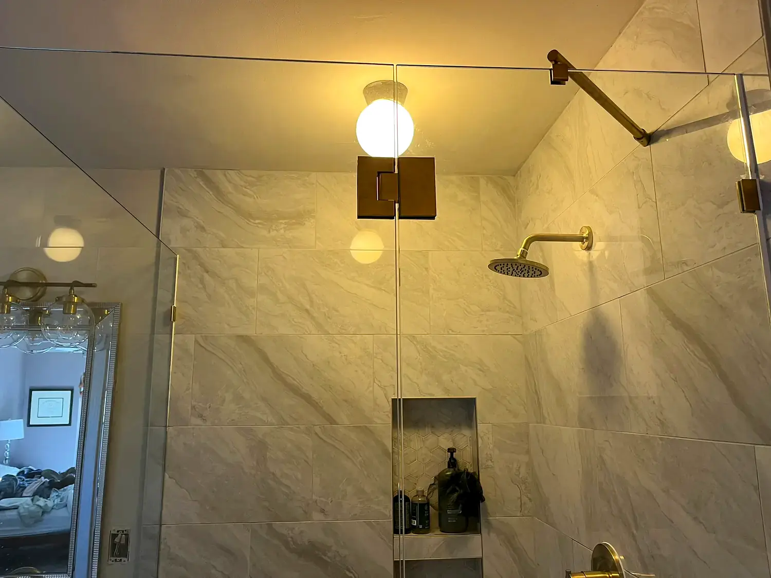 Brass shower suite, bathroom remodeling project in Northern Virginia by HOM Design & Build, view 3