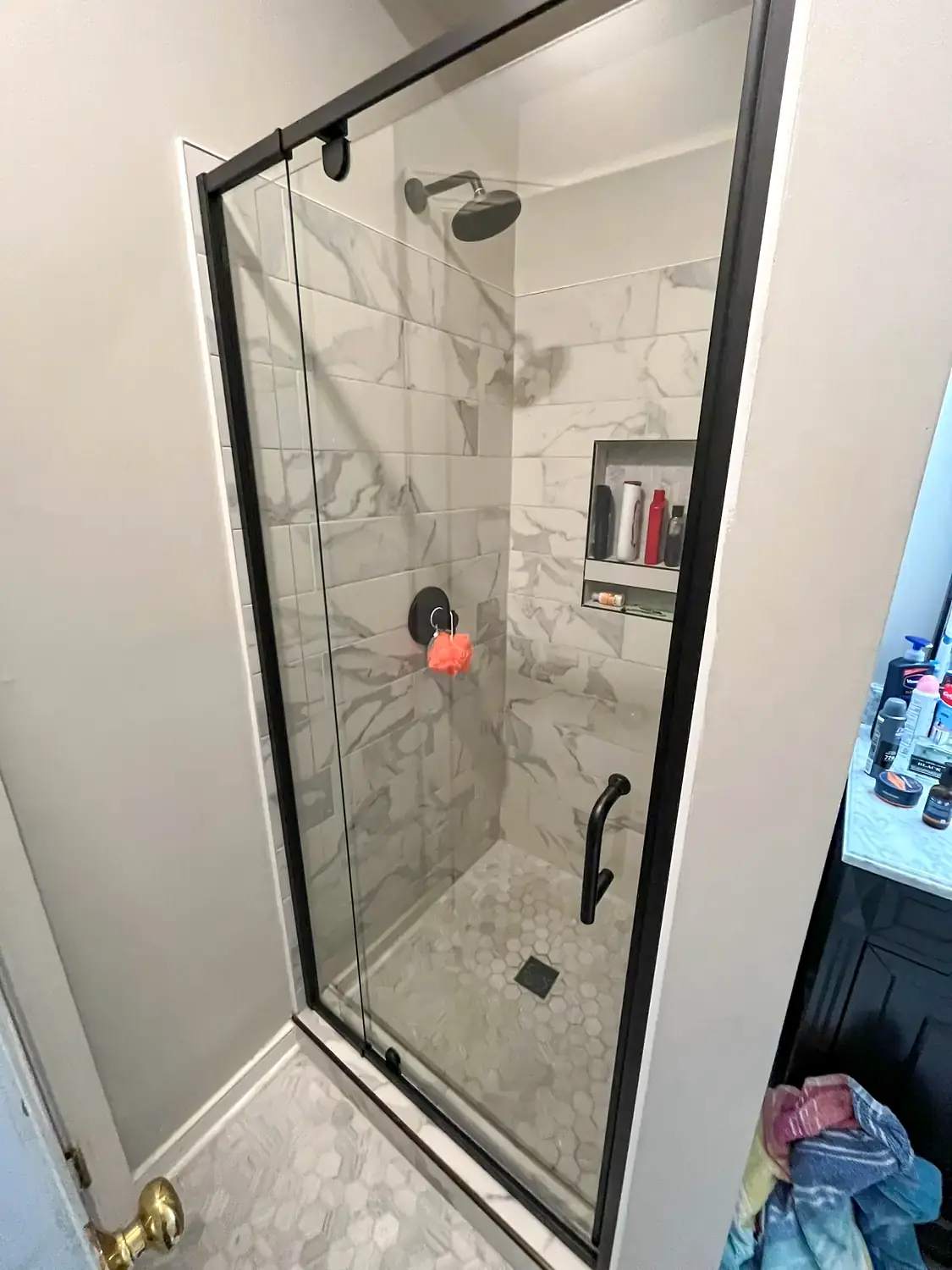 Brass shower suite, bathroom remodeling project in Northern Virginia by HOM Design & Build, view 4