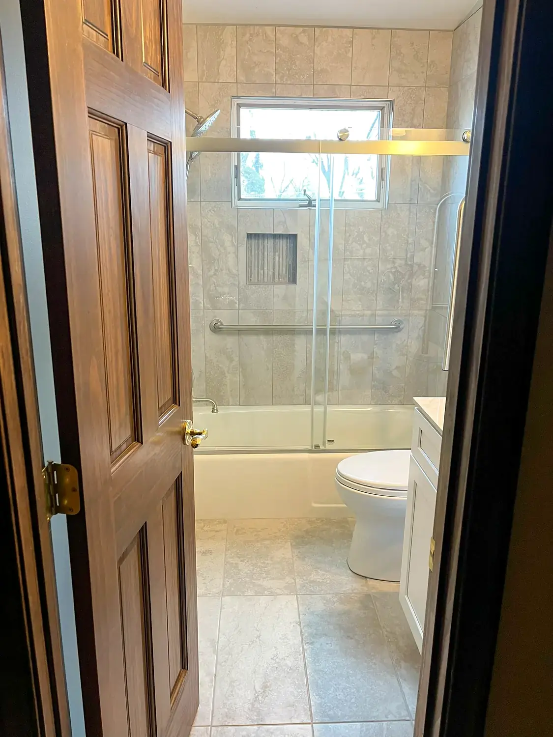 Tub-shower enclosure, bathroom remodeling project in Northern Virginia by HOM Design & Build, view 1
