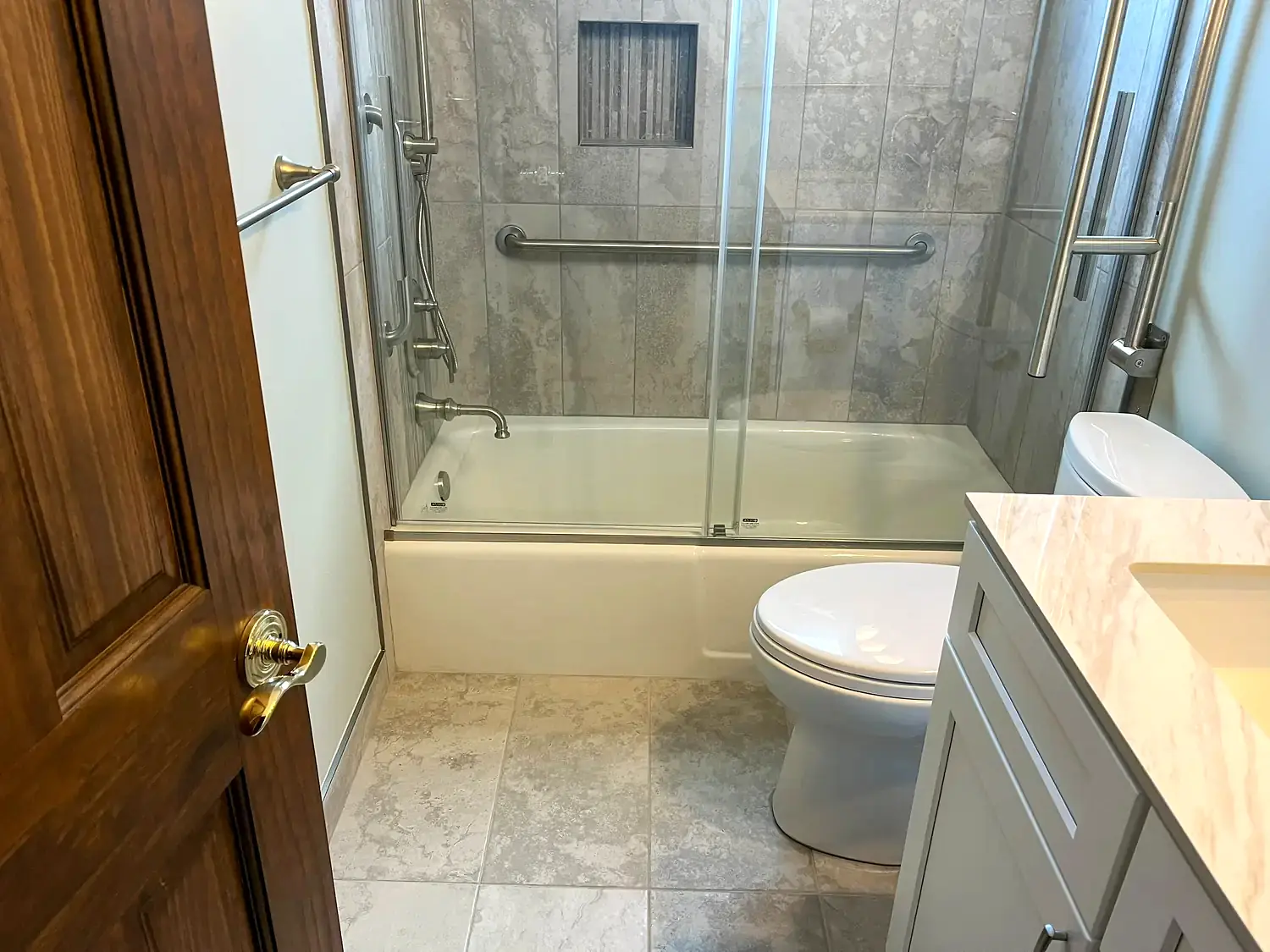 Tub-shower enclosure, bathroom remodeling project in Northern Virginia by HOM Design & Build, view 2