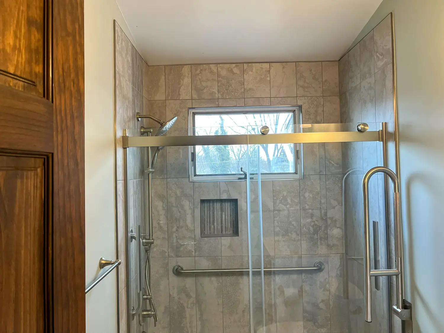 Tub-shower enclosure, bathroom remodeling project in Northern Virginia by HOM Design & Build, view 3