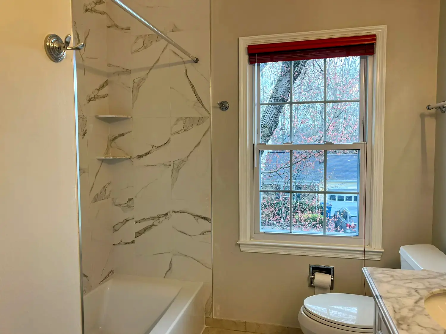 Large-format tub surround, bathroom remodeling project in Northern Virginia by HOM Design & Build, view 2