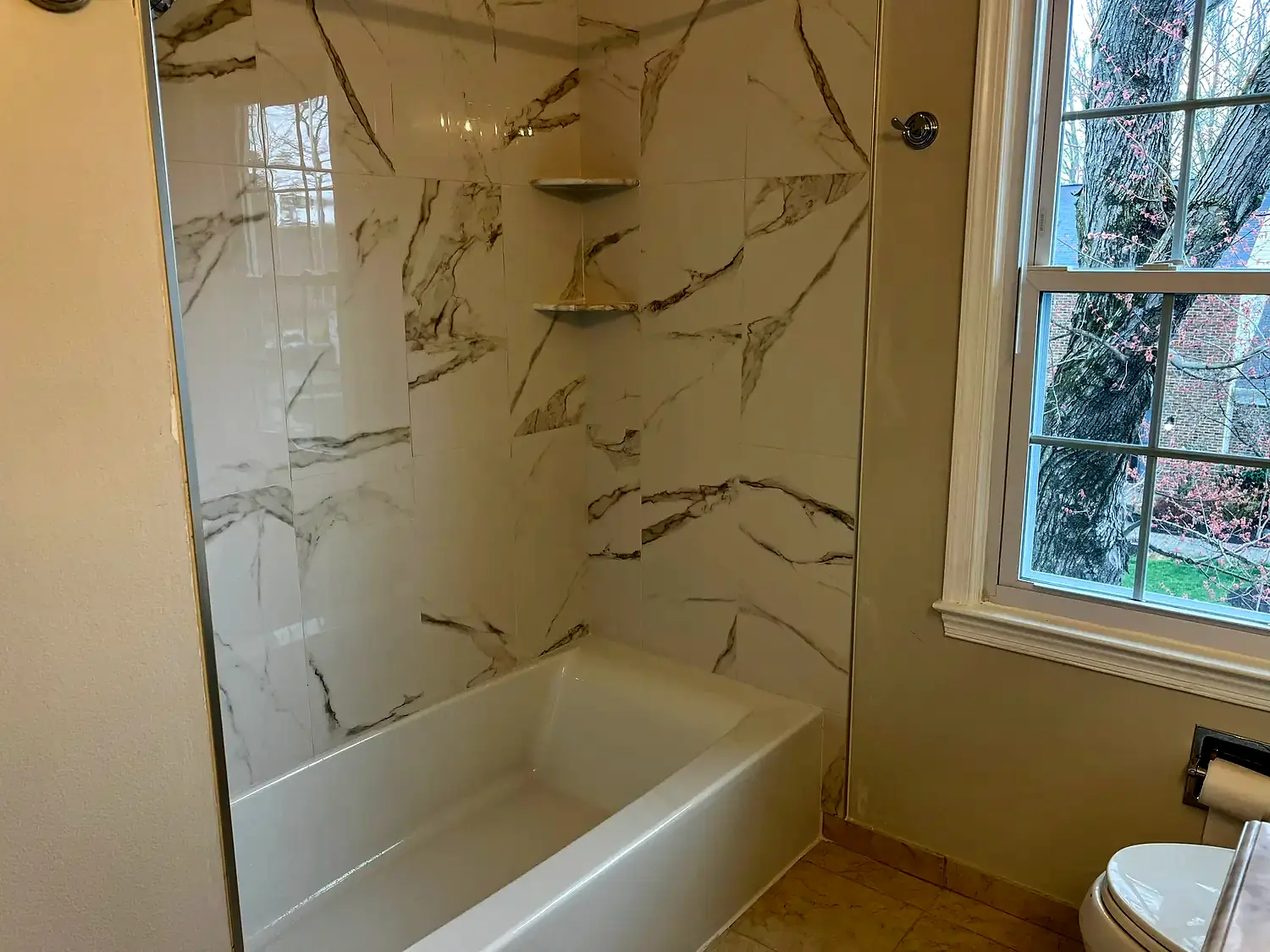 Large-format tub surround, bathroom remodeling project in Northern Virginia by HOM Design & Build, view 3