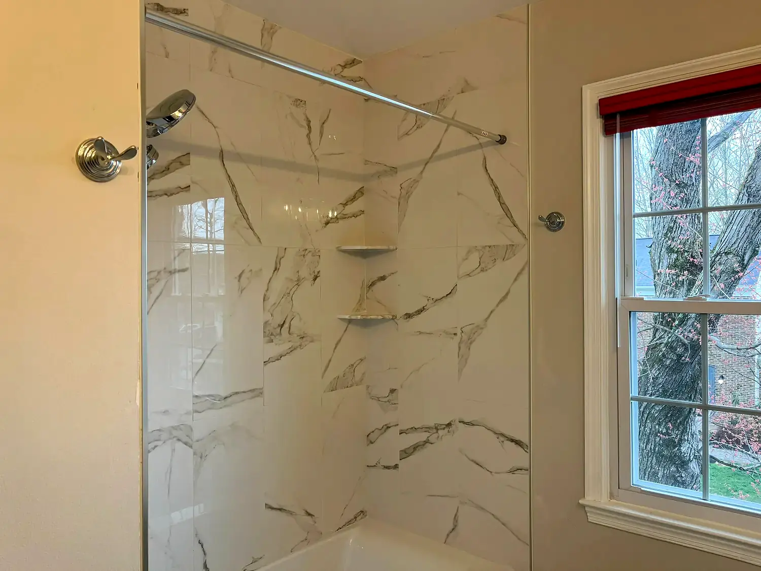 Large-format tub surround, bathroom remodeling project in Northern Virginia by HOM Design & Build, view 4