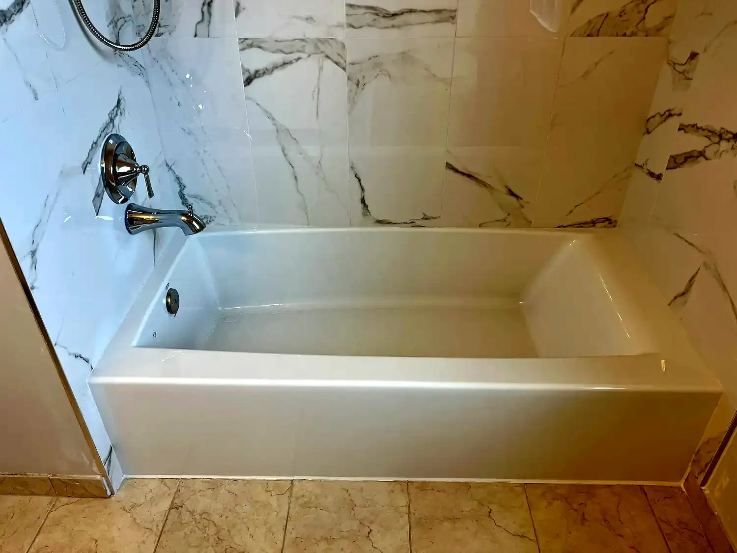 Large-format tub surround, bathroom remodeling project in Northern Virginia by HOM Design & Build, view 5