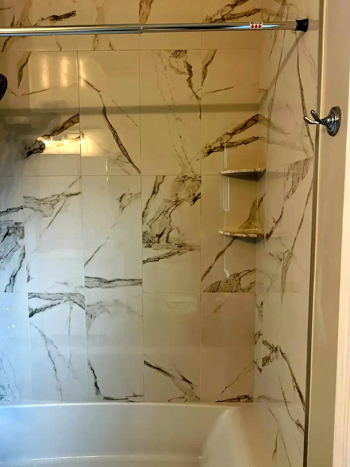 Large-format tub surround, bathroom remodeling project in Northern Virginia by HOM Design & Build, view 7