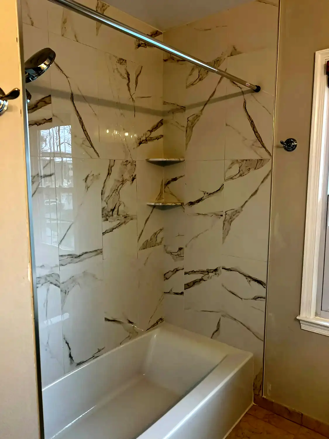 Large-format tub surround, bathroom remodeling project in Northern Virginia by HOM Design & Build, view 8