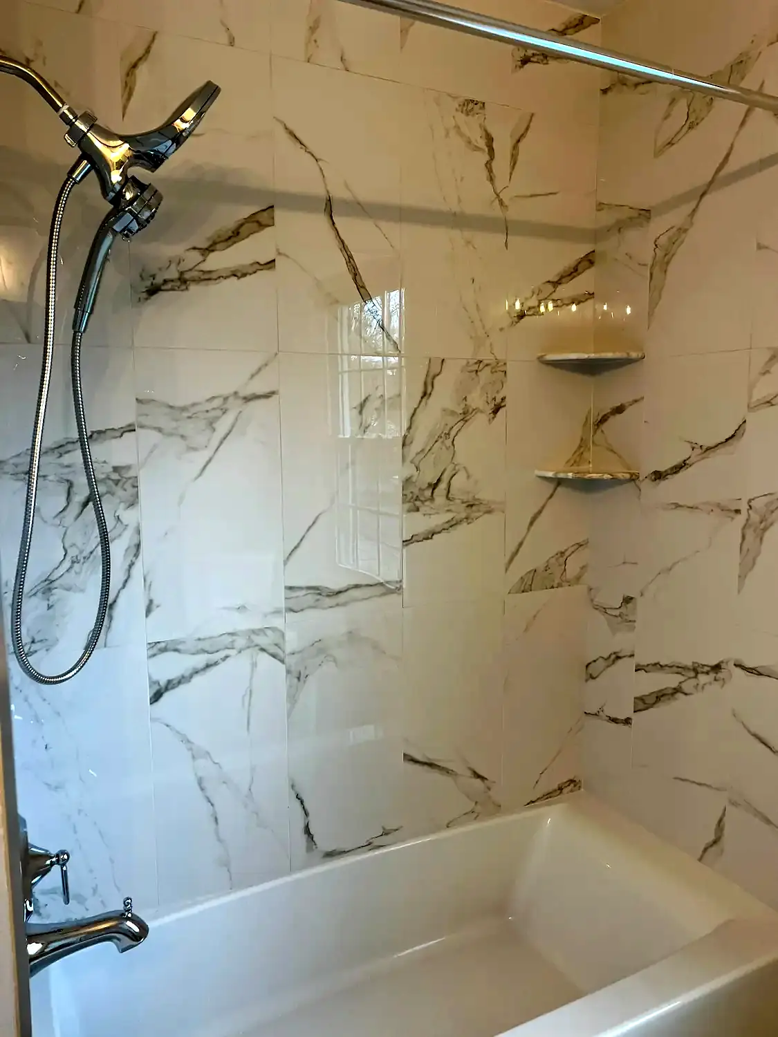 Large-format tub surround, bathroom remodeling project in Northern Virginia by HOM Design & Build, view 9