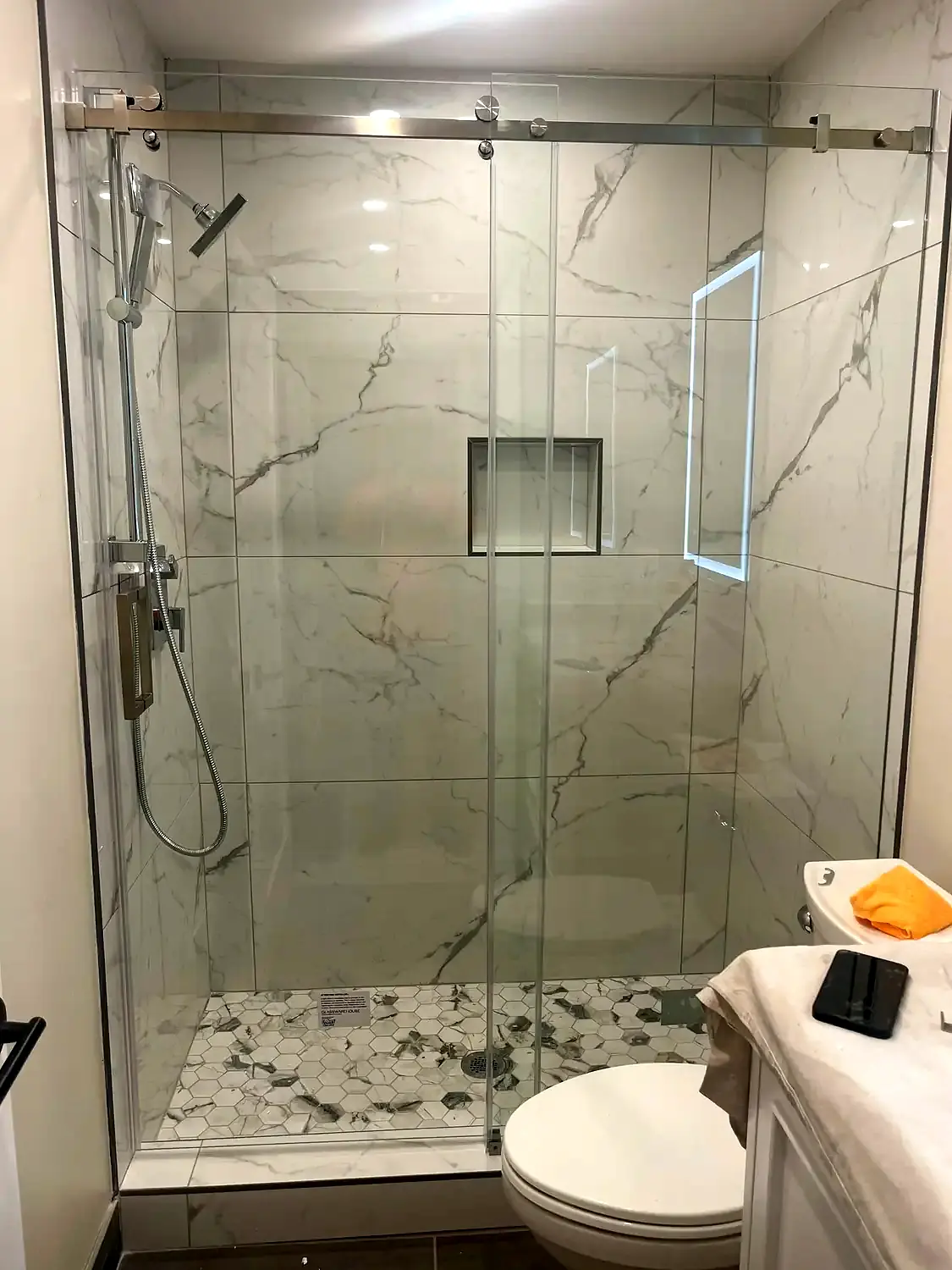 Glass shower renovation, bathroom remodeling project in Northern Virginia by HOM Design & Build, view 1