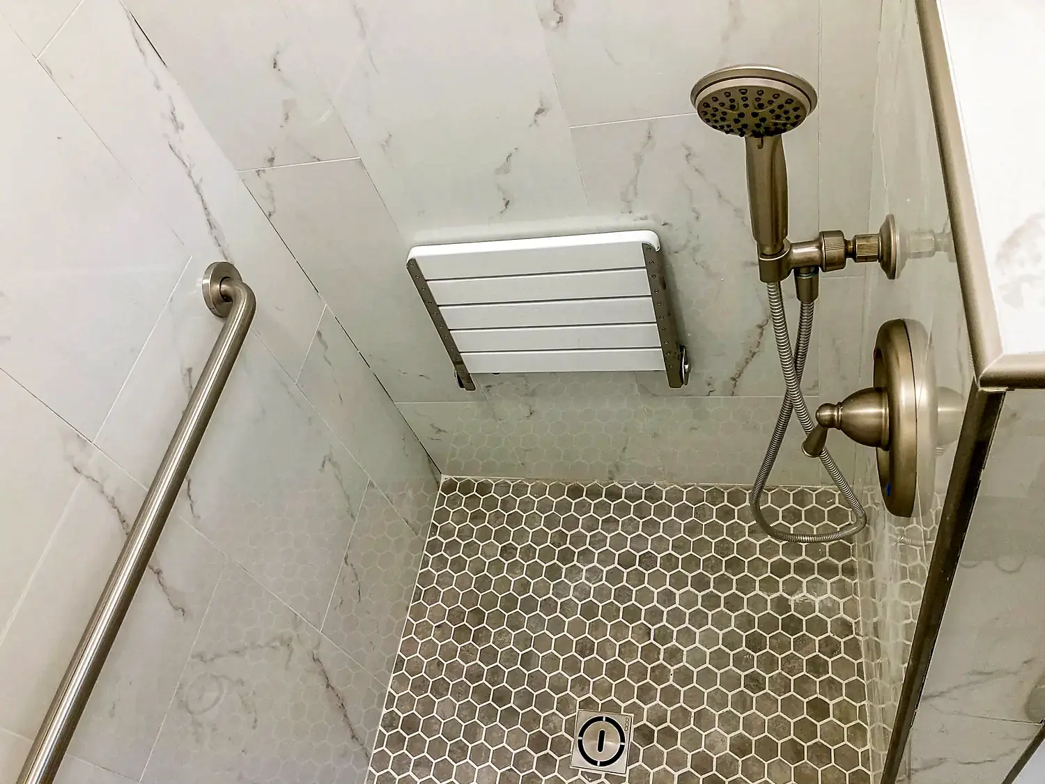 Compact walk-in shower, bathroom remodeling project in Northern Virginia by HOM Design & Build, view 1