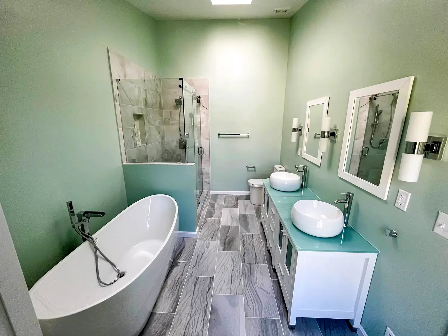 Freestanding-tub primary bathroom, bathroom remodeling project in Northern Virginia by HOM Design & Build, view 1