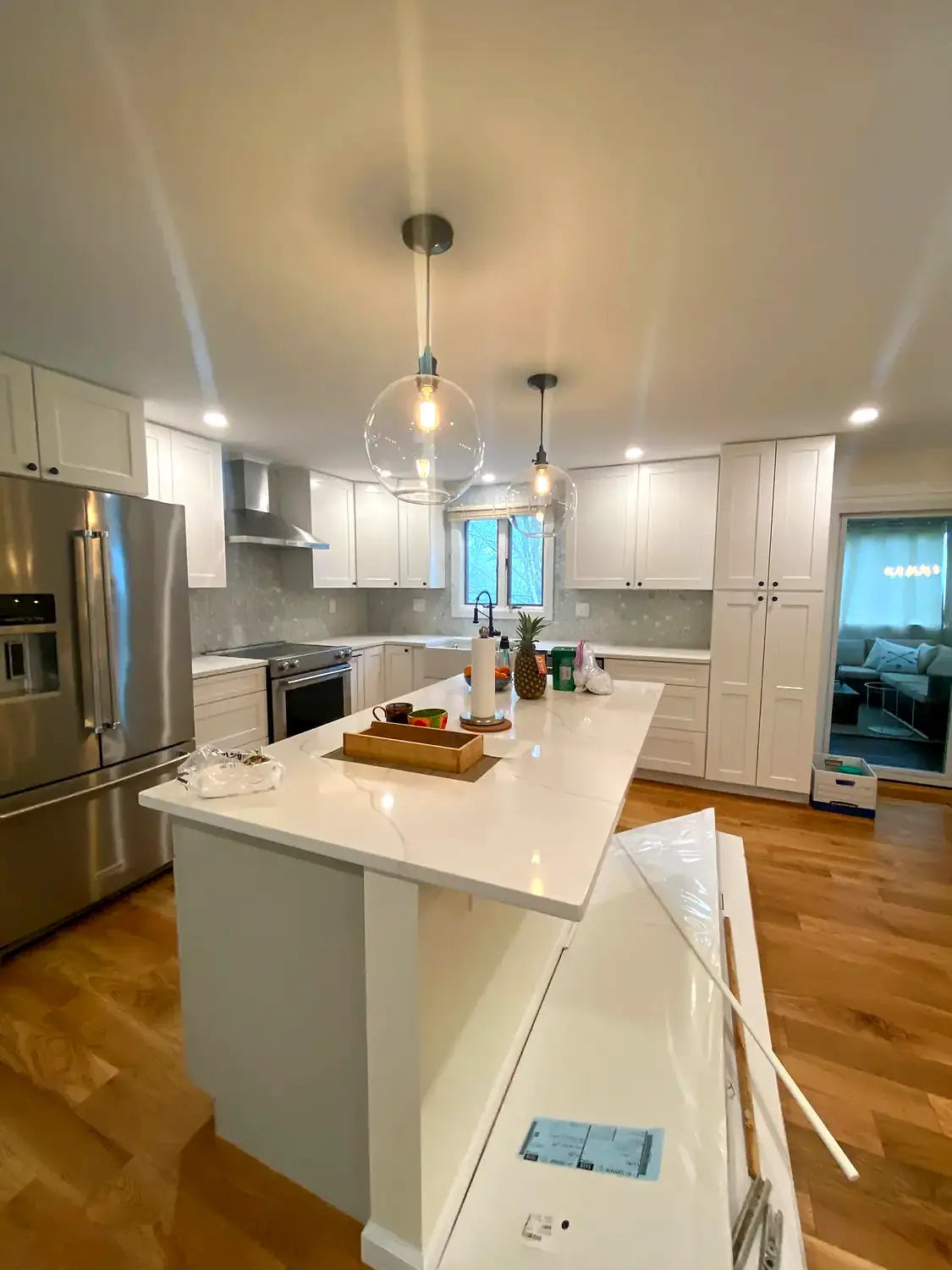 Open white kitchen, kitchen remodeling project in Northern Virginia by HOM Design & Build, view 2