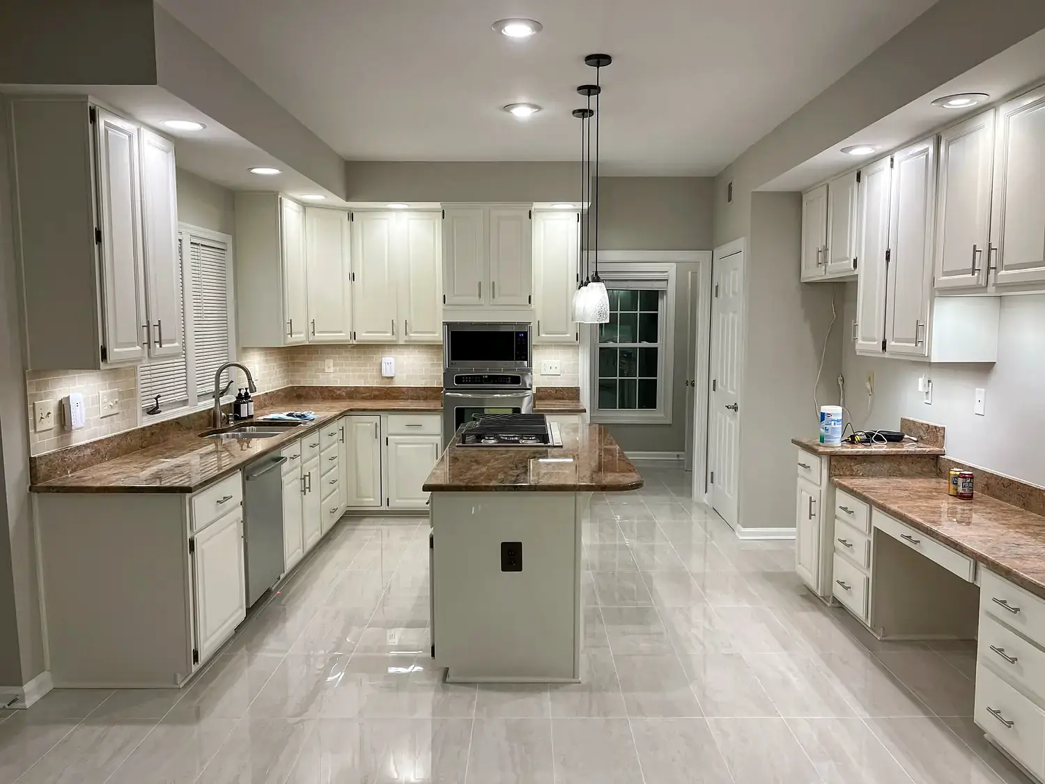 Detailed cabinet and island renovation, kitchen remodeling project in Northern Virginia by HOM Design & Build, view 1