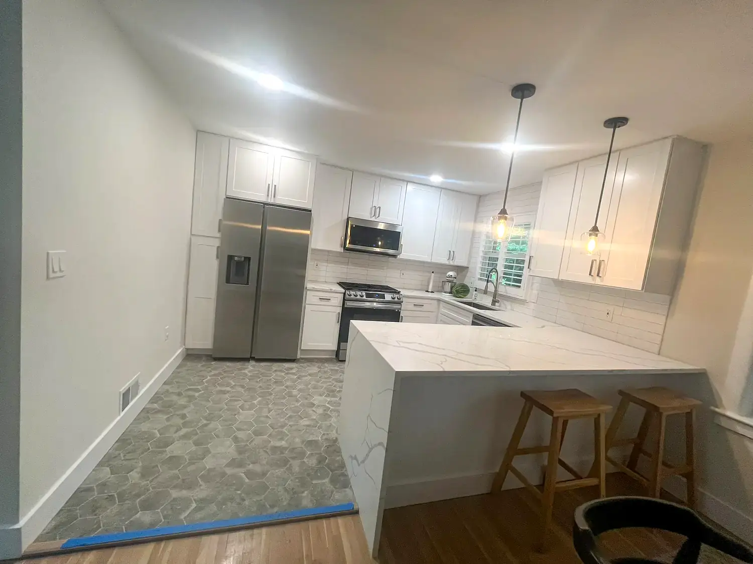 Detailed cabinet and island renovation, kitchen remodeling project in Northern Virginia by HOM Design & Build, view 5