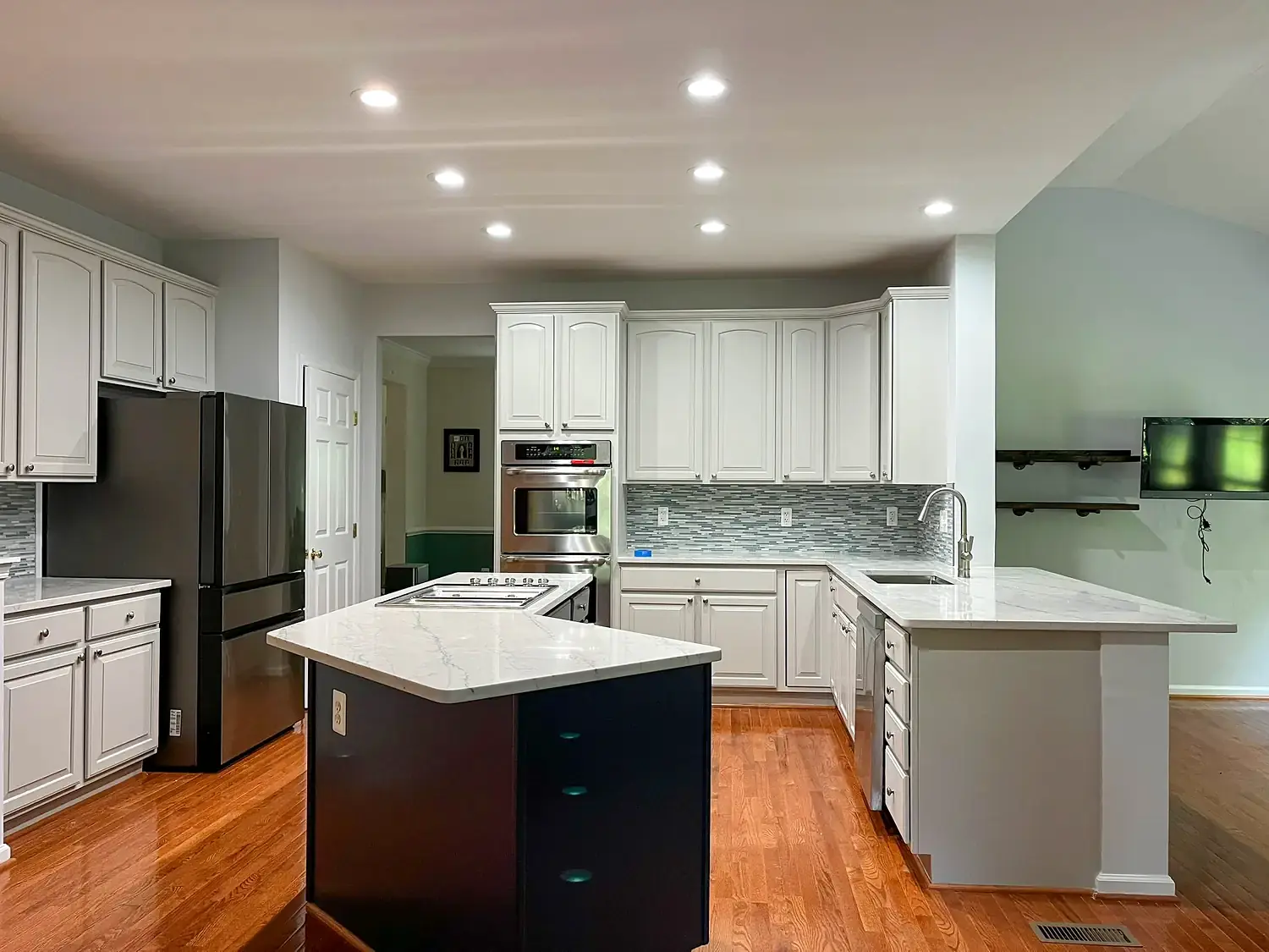 Two-tone island kitchen, kitchen remodeling project in Northern Virginia by HOM Design & Build, view 2