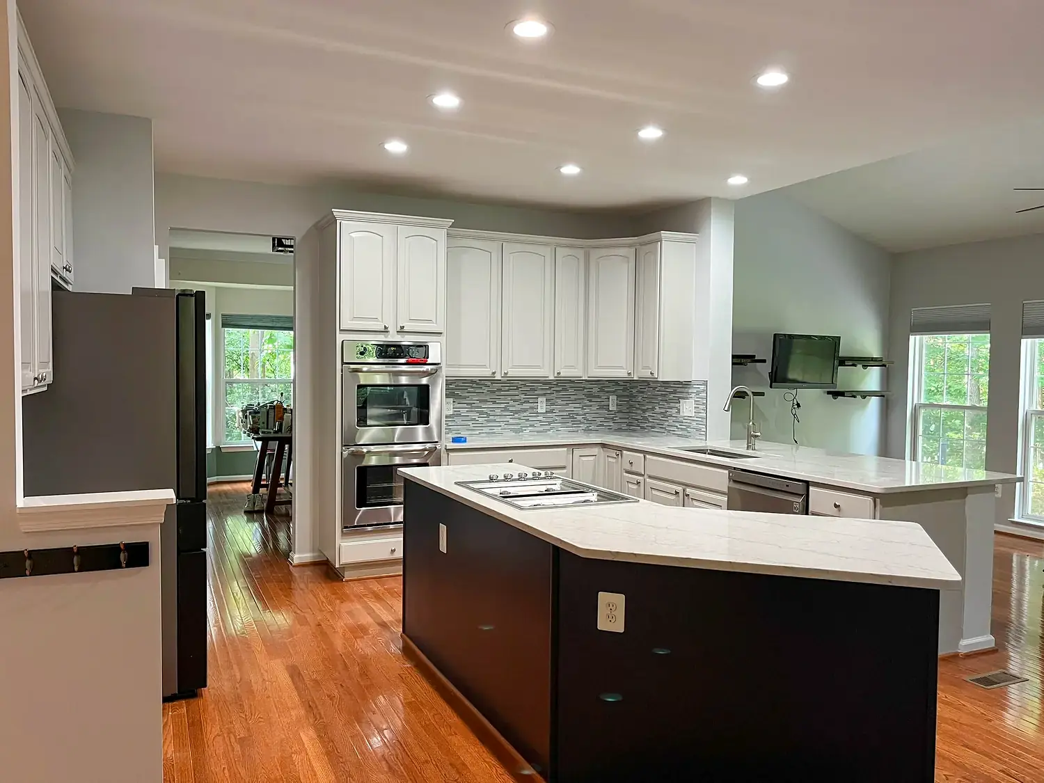 Two-tone island kitchen, kitchen remodeling project in Northern Virginia by HOM Design & Build, view 3