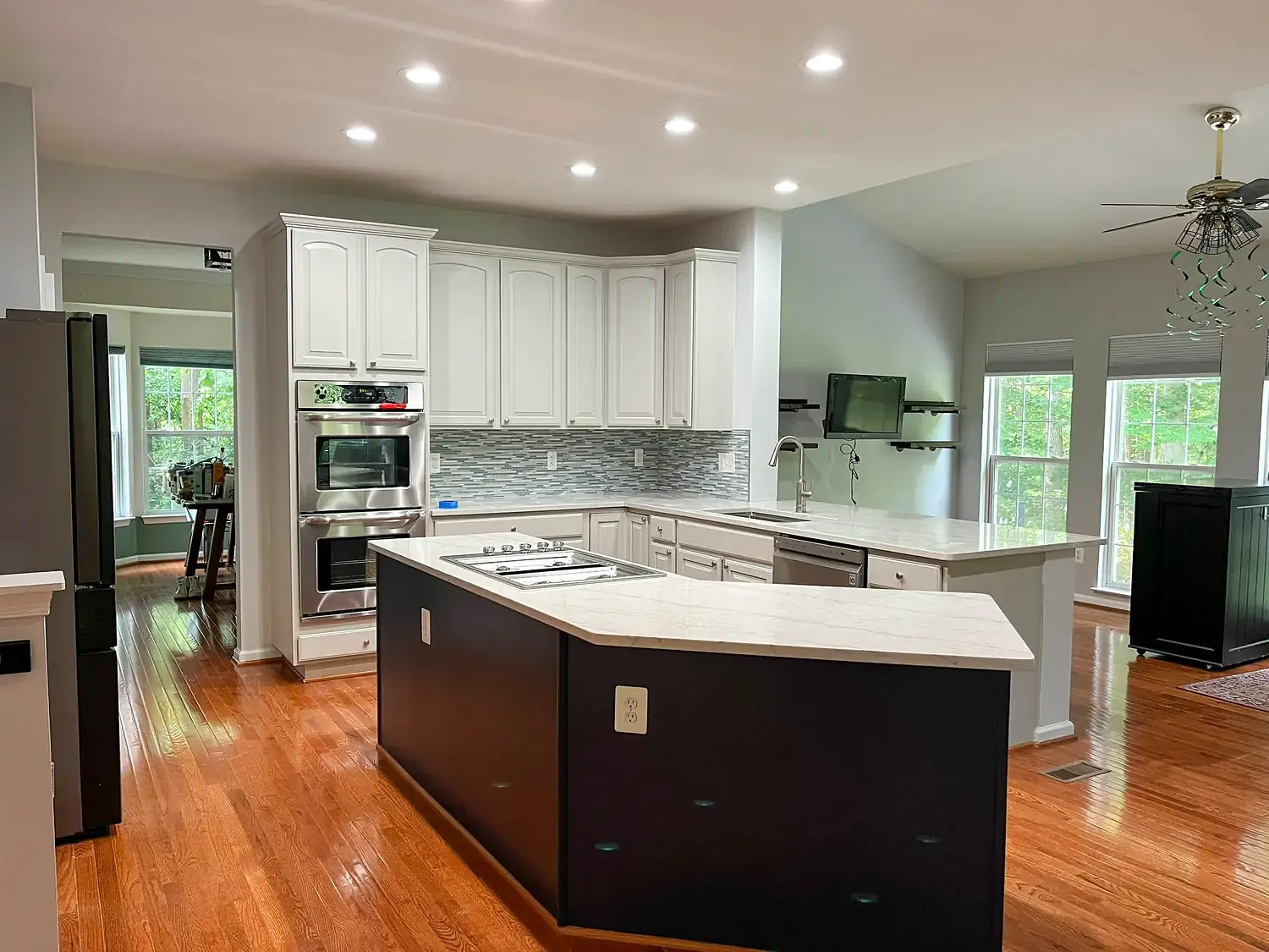 Two-tone island kitchen, kitchen remodeling project in Northern Virginia by HOM Design & Build, view 4