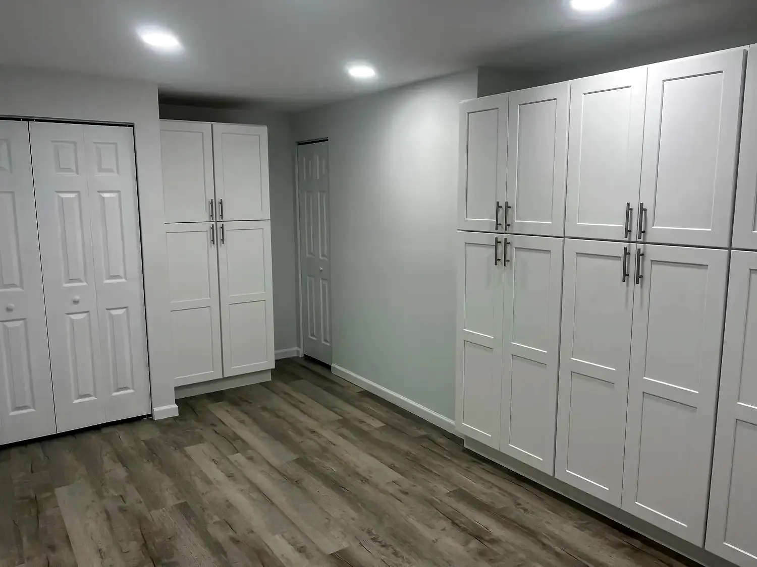 Laundry and storage room, whole-home remodeling project in Northern Virginia by HOM Design & Build, view 3