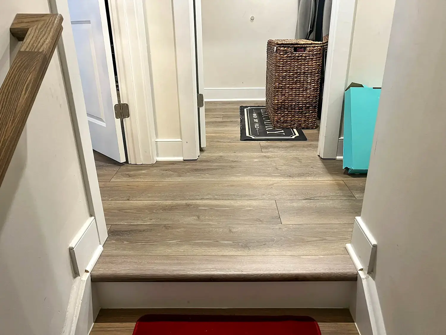 Hardwood landing and stair refinishing, flooring project in Northern Virginia by HOM Design & Build, view 1