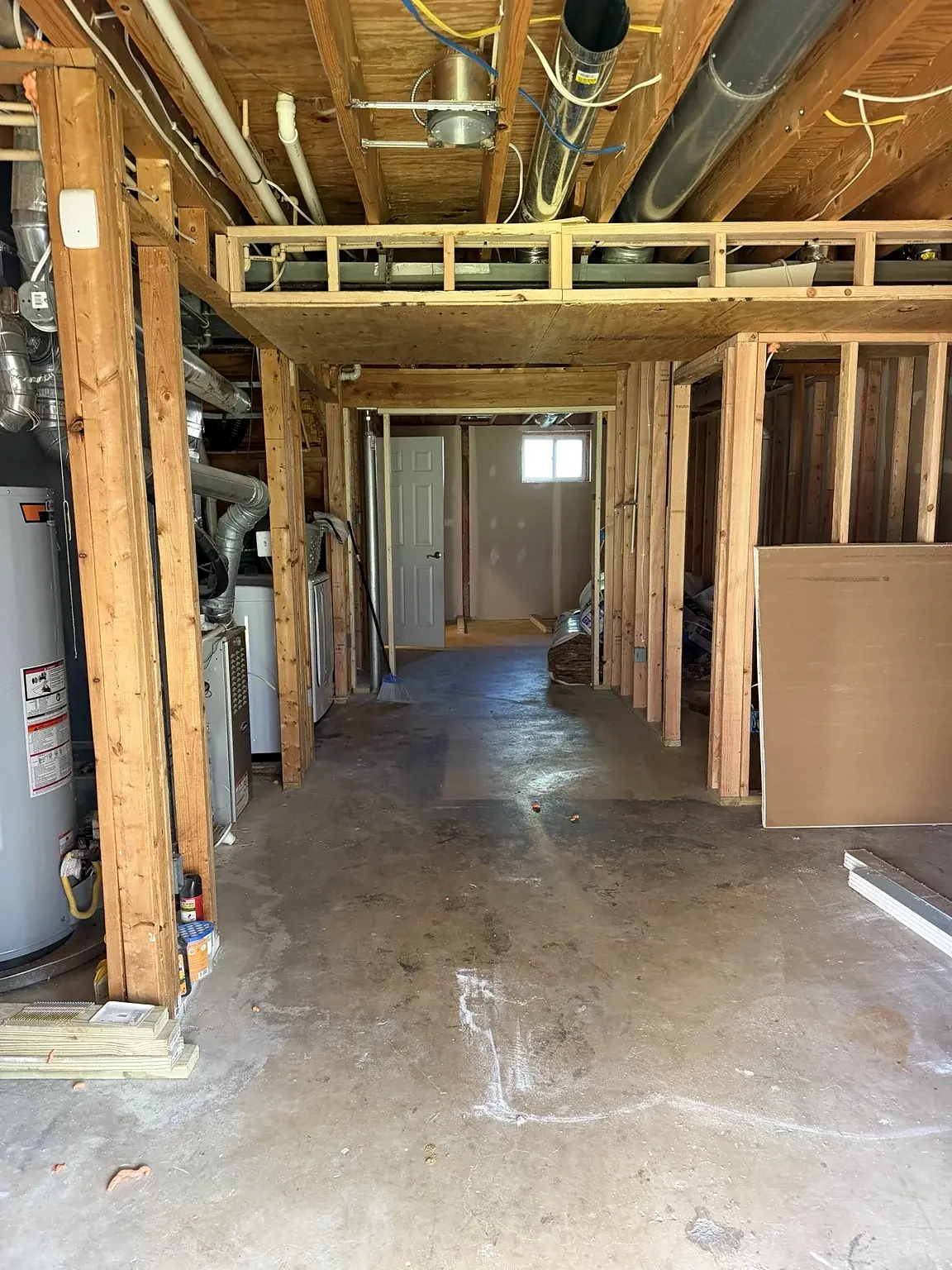 Framed doorways connecting the lower-level rooms in Prince William Commons, Woodbridge, Virginia